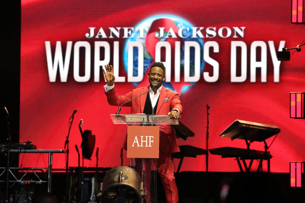 HOUSTON, TEXAS - DECEMBER 01: Blair Underwood salutes attendees following receipt of Lifetime Achievement Award at NRG Arena on December 01, 2023 in Houston, Texas. (Photo by Bob Levey/Getty Images for AIDS Healthcare Foundation)